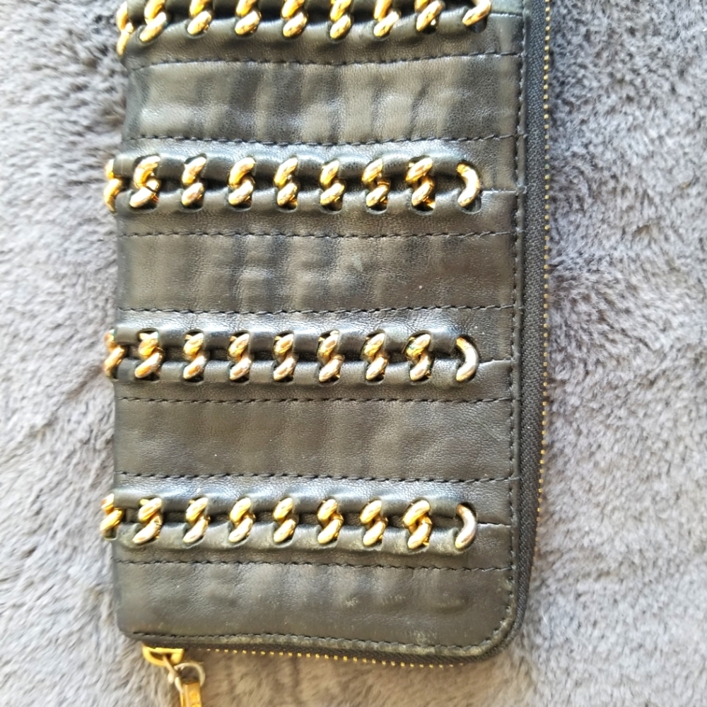 TORY BURCH ZIPPERED BLACK LEATHER WALLET WITH GOLD CHANS BRAIDEDINTO OUTSIDE